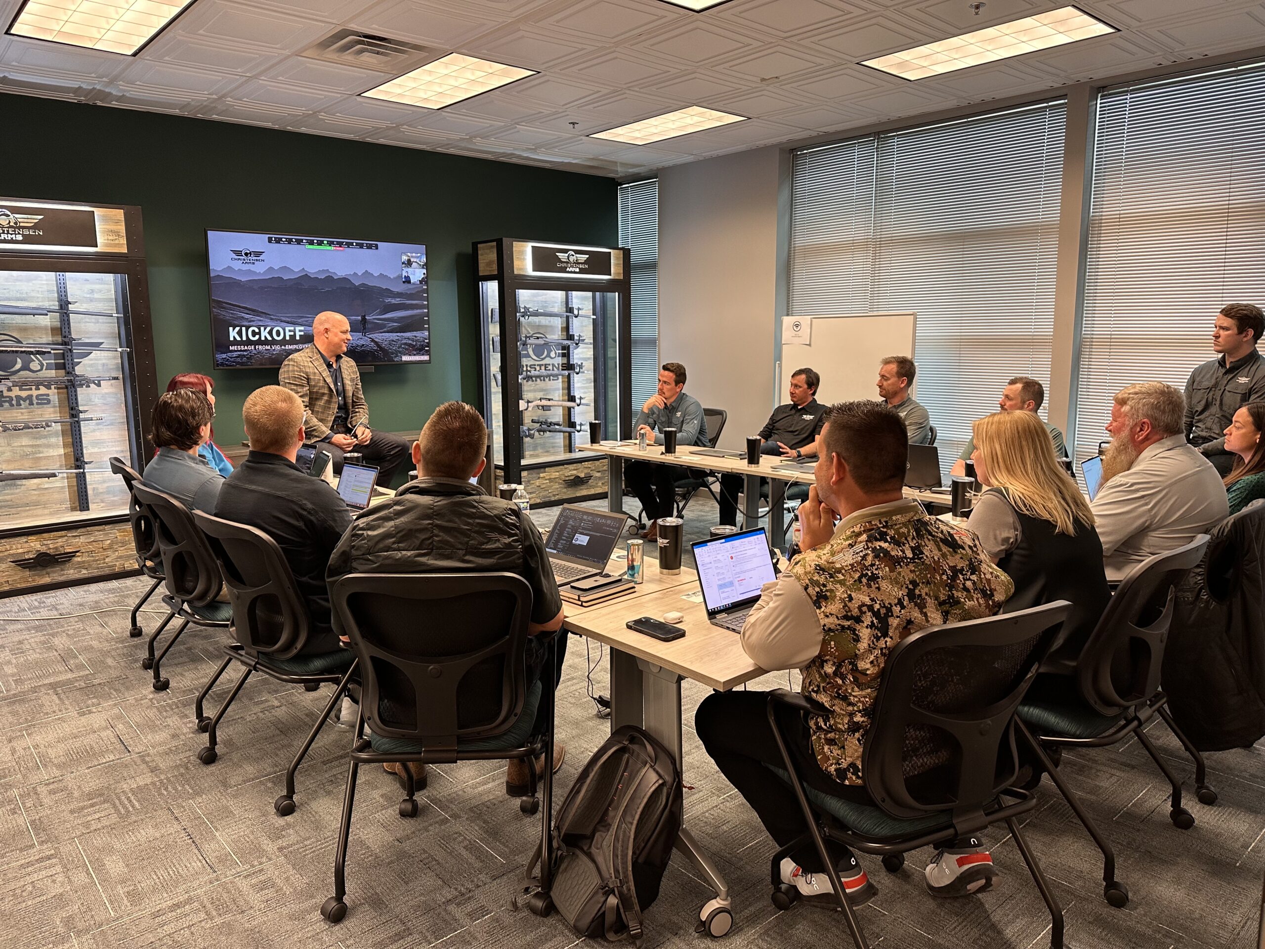 Vic speaks with the employees of Christensen Arms.